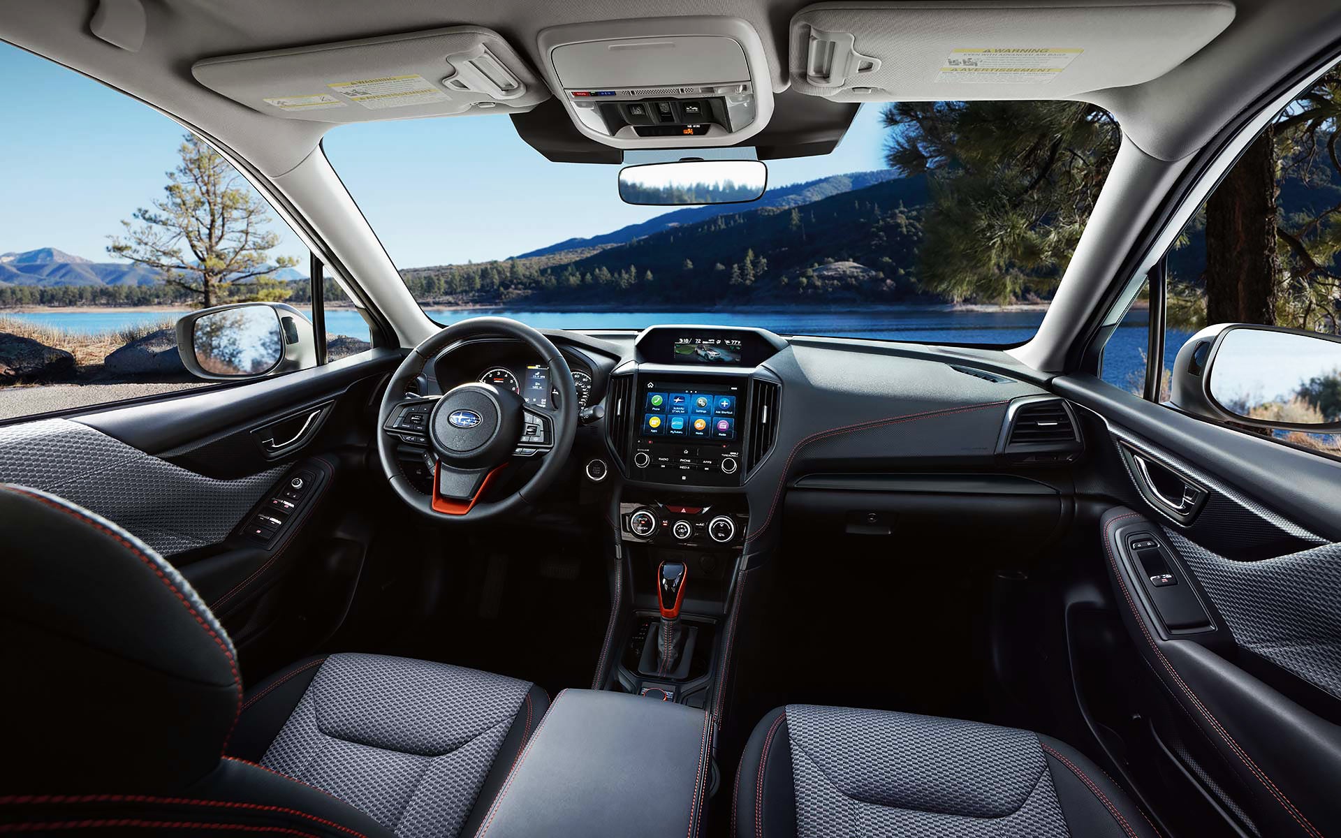 The interior and front dash of the 2022 Forester. | Briggs Subaru of Topeka in Topeka KS