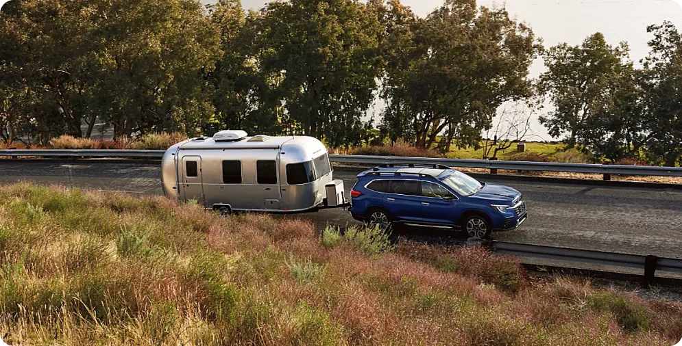 2026 Subaru Ascent towing an Airstream trailer on the highway