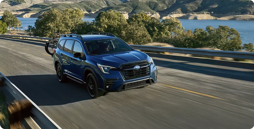 2026 Subaru Ascent parked outside a home at golden hour