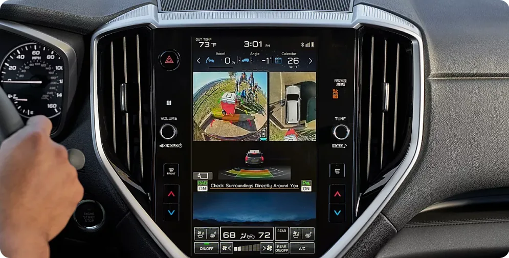 Driver using the 360-degree Surround View Monitor while parking