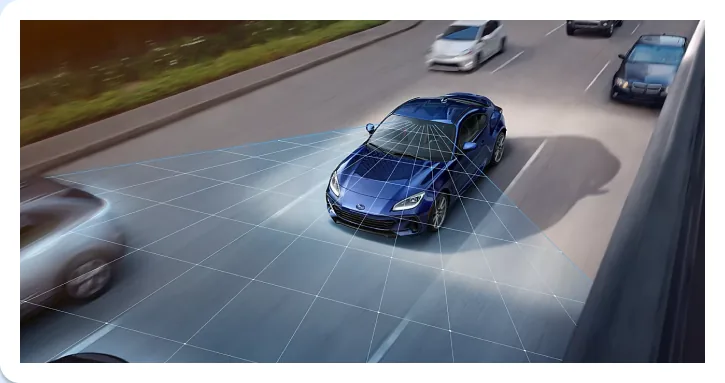 EyeSight detection field visualised around a Subaru BRZ in highway traffic