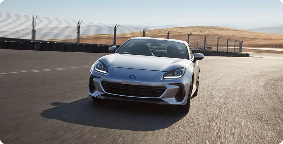 2026 Subaru BRZ turning in on a track with its track-tuned suspension