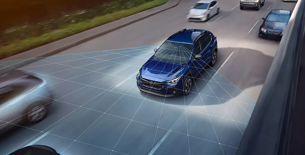 EyeSight sensor field visualised around a blue 2026 Subaru Crosstrek in highway traffic