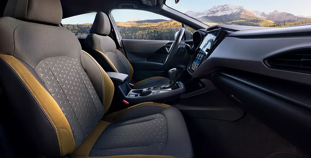 Two-tone Sport Cloth upholstery with yellow contrast stitching in the 2026 Crosstrek Sport