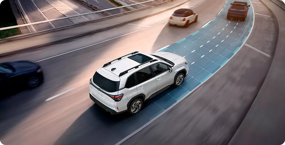 Lane-centering guidance visualised around a white 2026 Subaru Forester in highway traffic