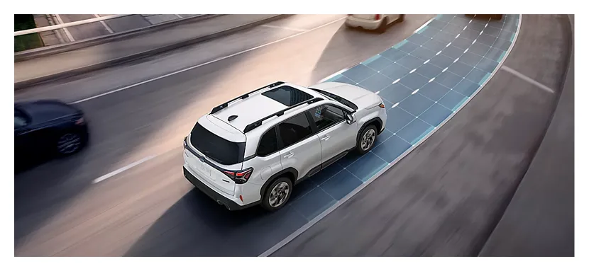Advanced Adaptive Cruise Control with Lane Centering guiding a white 2026 Subaru Forester Hybrid