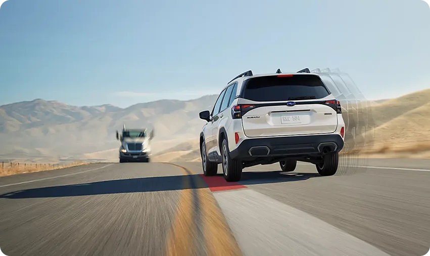 Pre-collision detection highlighted ahead of a white 2026 Subaru Forester Hybrid