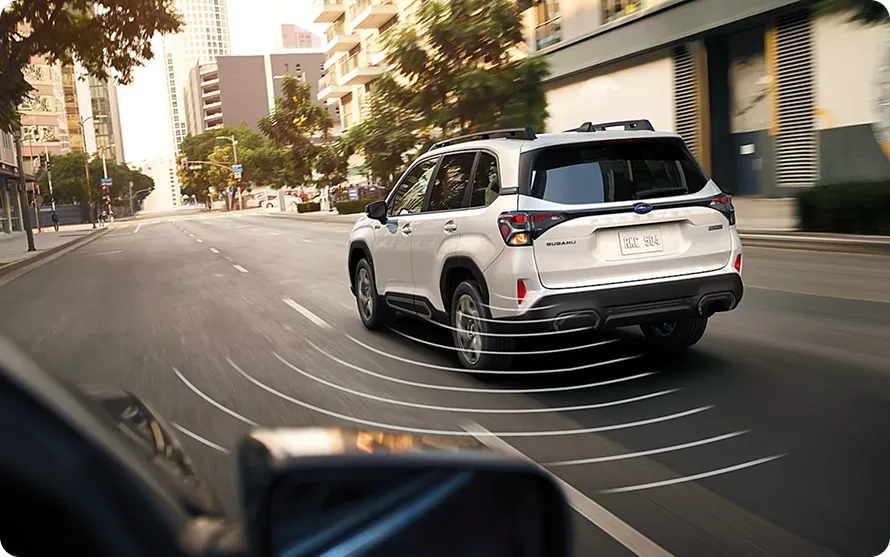 All-around awareness sensors visualised around a white 2026 Subaru Forester Hybrid in city traffic
