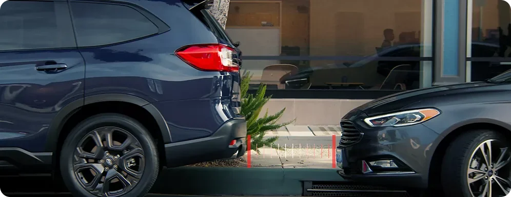 Reverse Automatic Braking detecting a car behind a reversing Subaru