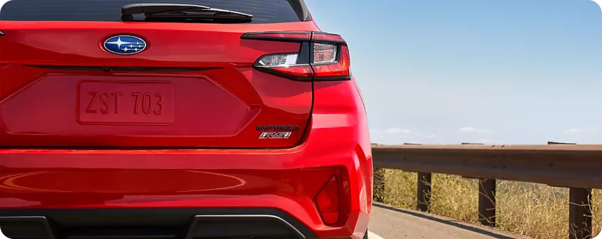 Taillight and rear badge detail on the red 2026 Subaru Impreza RS