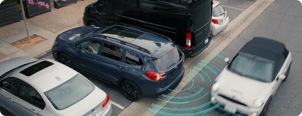 Rear Cross-Traffic Alert detecting a vehicle while reversing