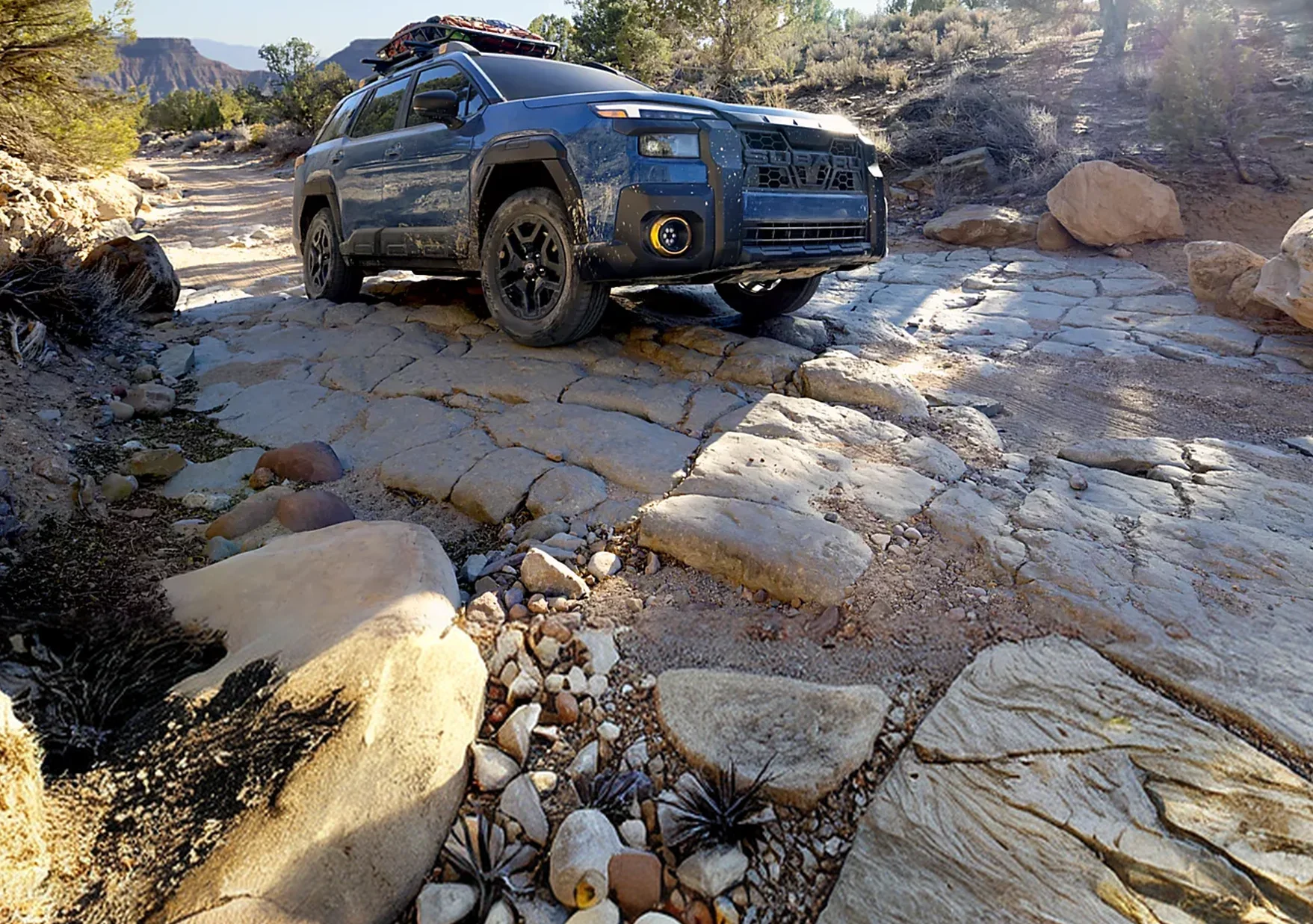 2026 Subaru Outback Wilderness climbing a rocky trail