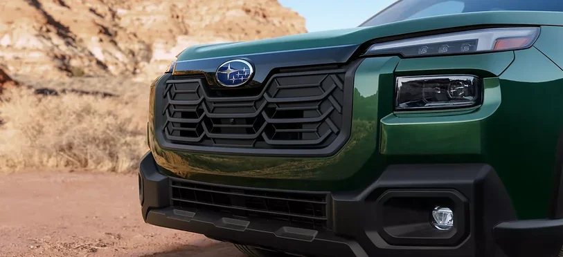 Redesigned 2026 Subaru Outback grille and headlight detail