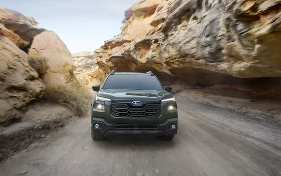 2026 Subaru Outback driving through a canyon pass