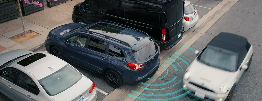 Rear Cross-Traffic Alert detecting approaching vehicles while reversing