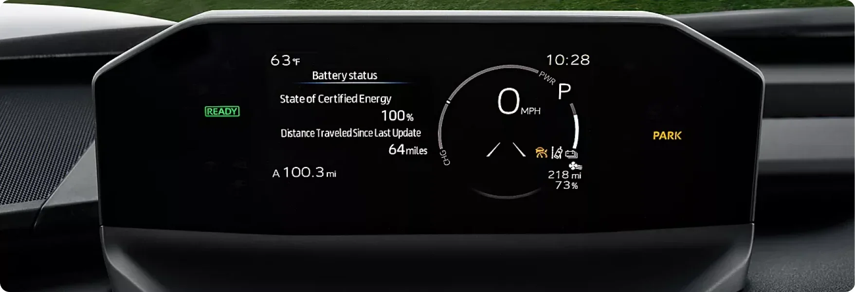 2026 Subaru Solterra instrument cluster showing a full battery and 218 miles of remaining range
