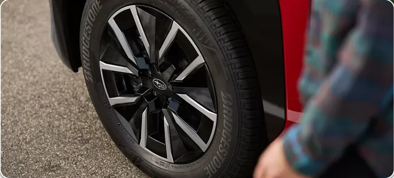 20-inch alloy wheel detail on a red 2026 Subaru Solterra