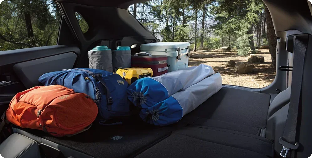 Camping gear loaded through the rear gate of a 2026 Subaru Solterra