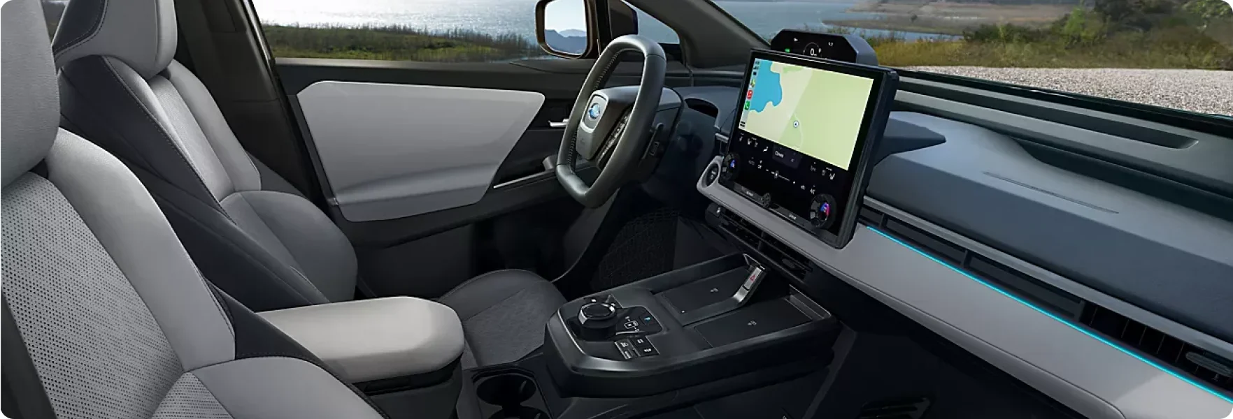 Front cabin of the 2026 Subaru Solterra with the 14-inch touchscreen showing navigation