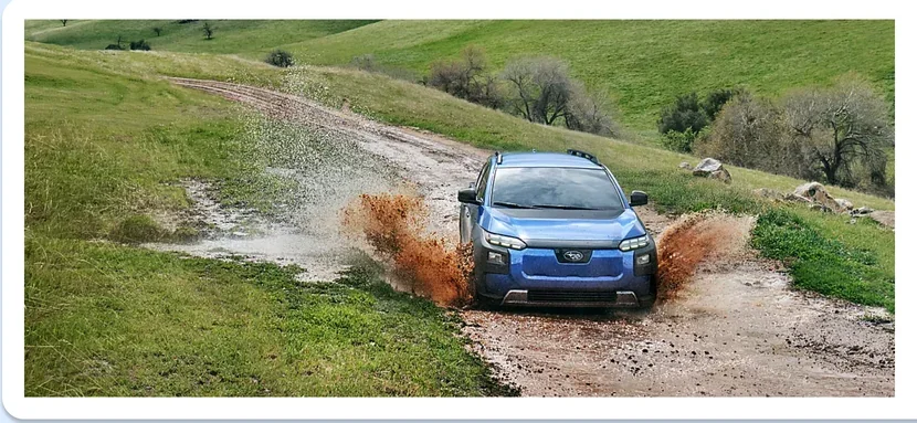 2026 Subaru Trailseeker throwing up mud on a rutted hillside track