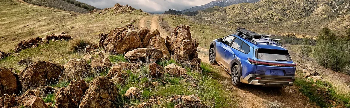 2026 Subaru Trailseeker climbing a rocky ridge trail