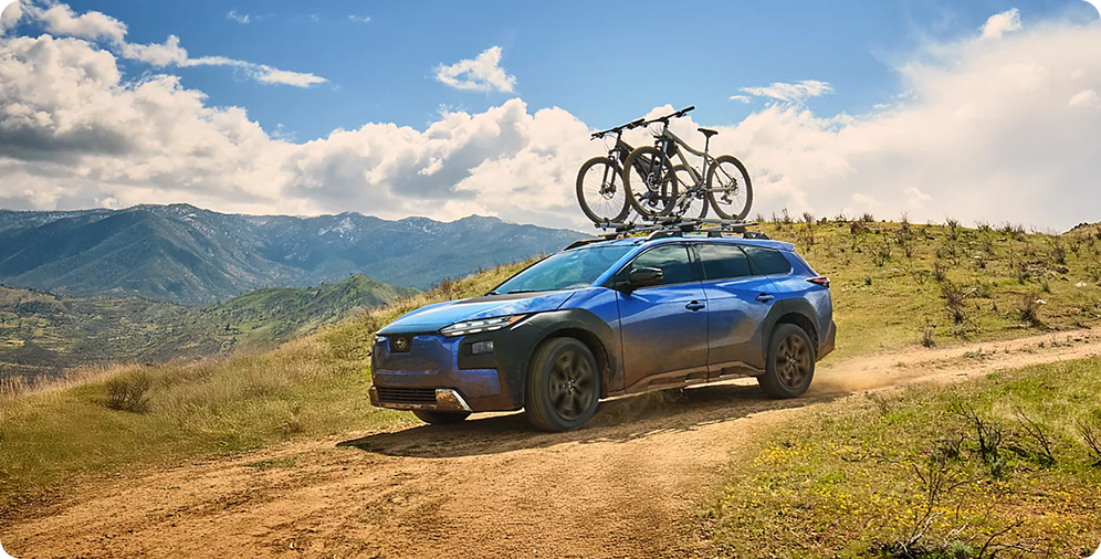2026 Subaru Trailseeker carrying mountain bikes on a high desert trail