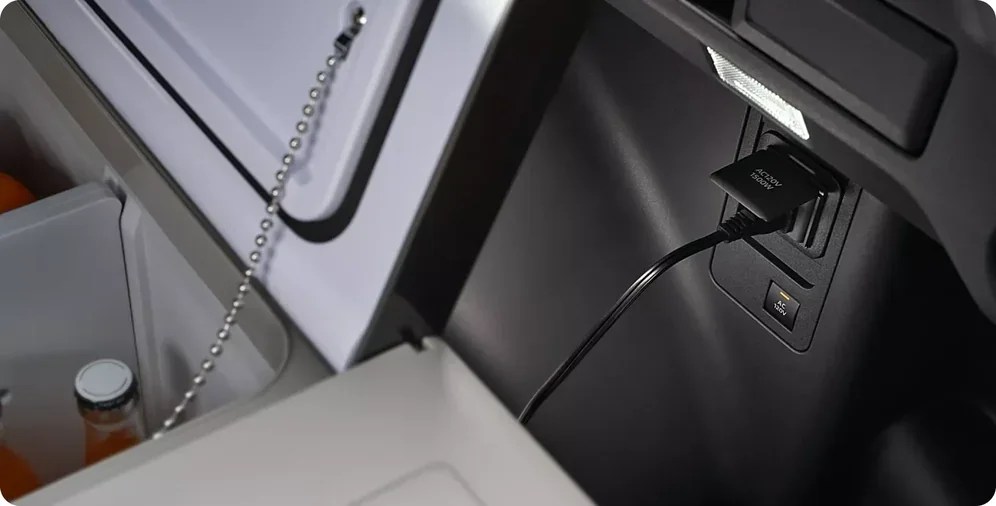 Centre console storage and charging ports inside the 2026 Subaru Trailseeker