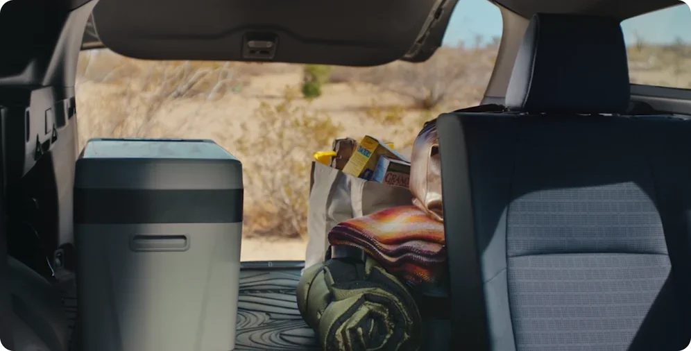 Cooler and camping gear packed into the rear cargo area of a 2026 Subaru Trailseeker