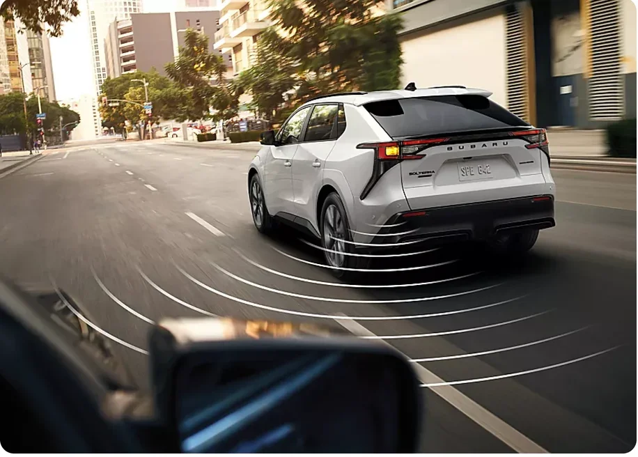Blind-Spot Monitor and Cross-Traffic Alert zones visualised around a Subaru Trailseeker