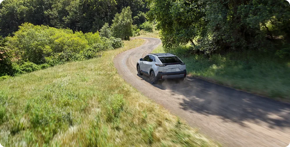 2026 Subaru Uncharted tracing a winding country road seen from above