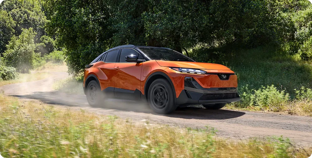 2026 Subaru Uncharted kicking up dust on a rutted dirt trail
