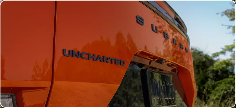 Uncharted and Subaru badging along the rear quarter panel