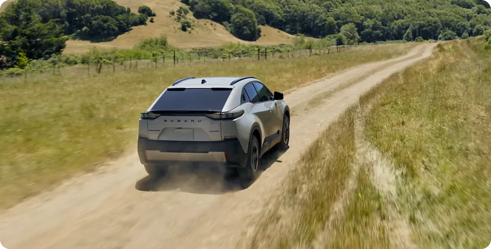 2026 Subaru Uncharted with low-profile roof rails on a dirt track