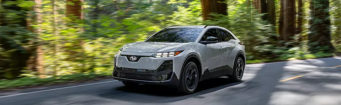 2026 Subaru Uncharted cornering on a forest highway