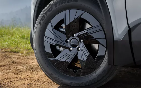 20-inch bladed alloy wheel and all-season tire detail
