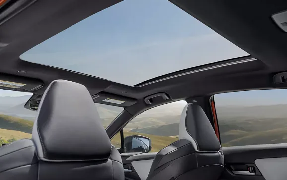 Panoramic fixed-glass roof seen from inside the cabin