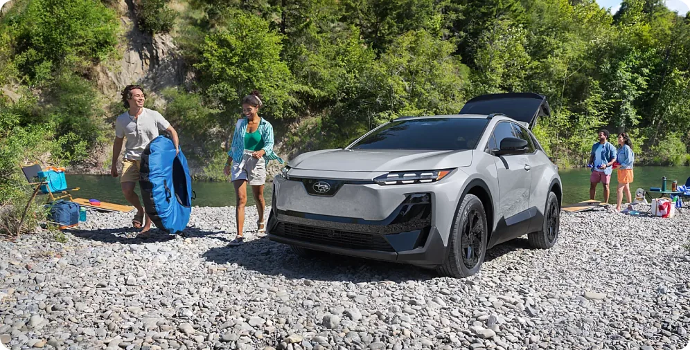 Family camping beside a 2026 Subaru Uncharted at a national park