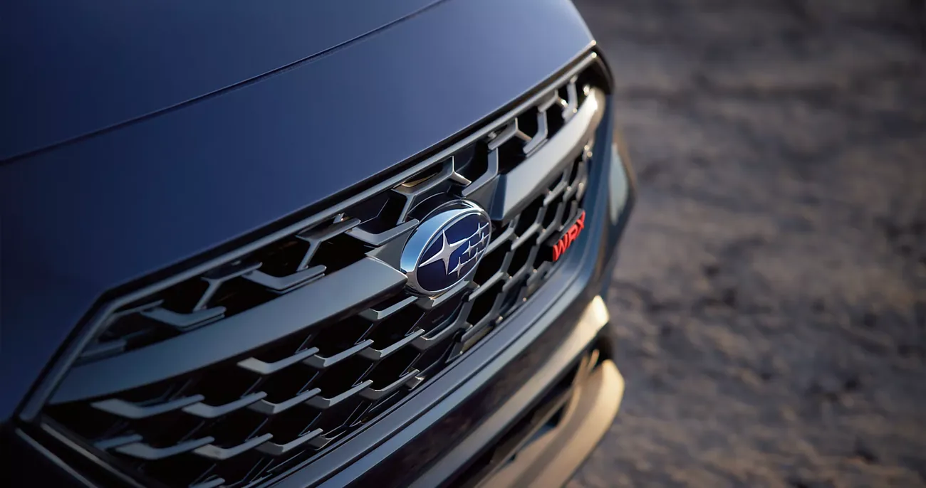 Aggressive front grille and Subaru badge on the 2026 WRX