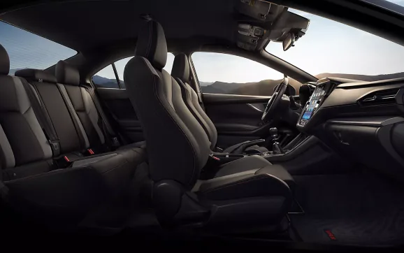 Front sport seats and cabin of the 2026 Subaru WRX seen from the passenger side
