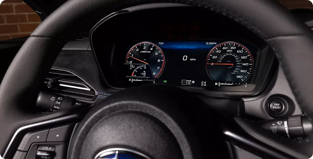 Fully digital instrument cluster behind the wheel of the 2026 Subaru WRX GT