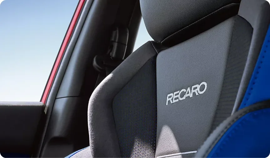 Recaro performance-design front seat inside the blue-trimmed 2026 Subaru WRX tS