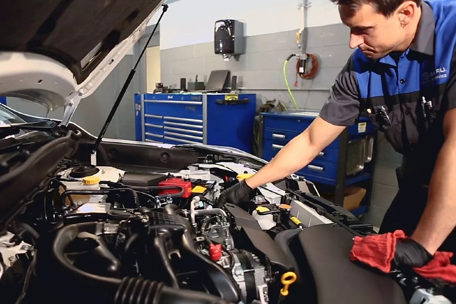 Factory Trained Subaru Technician Performing Service