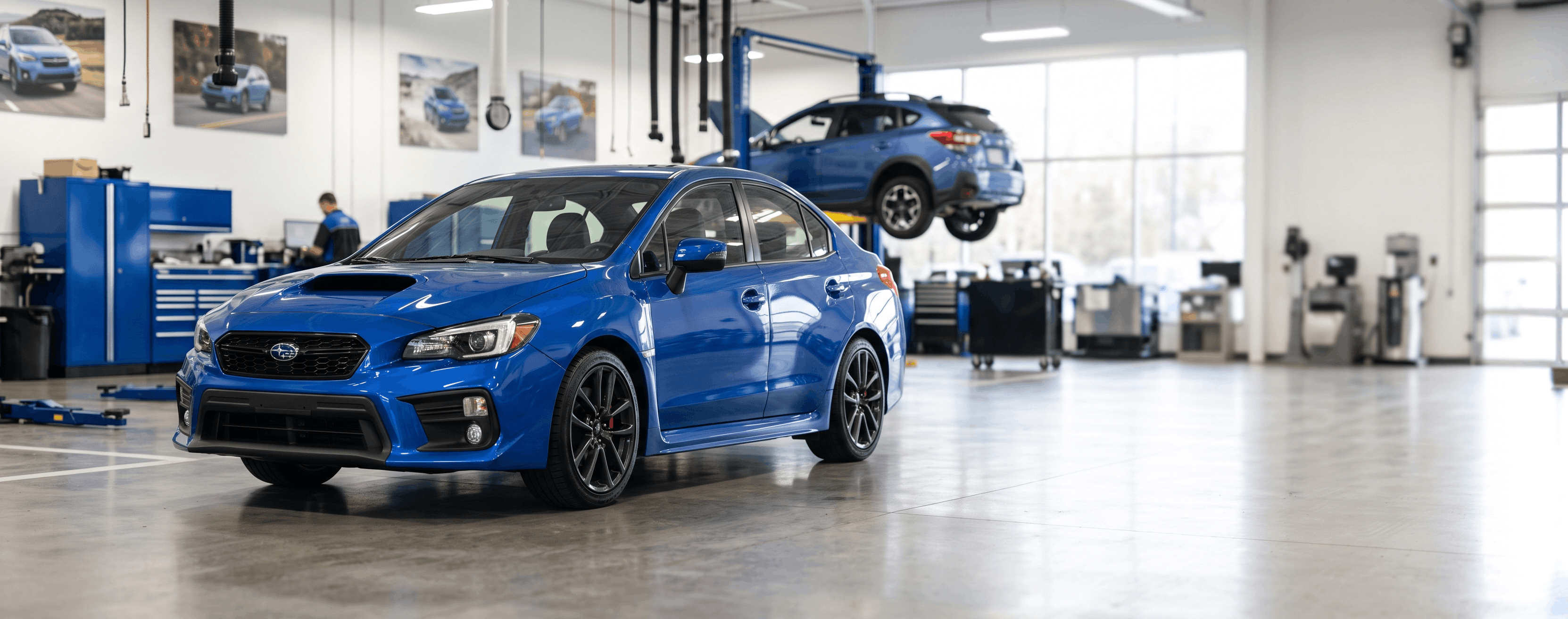 Briggs Subaru of Topeka technicians performing 30,000-mile scheduled maintenance service in the Topeka, KS service center