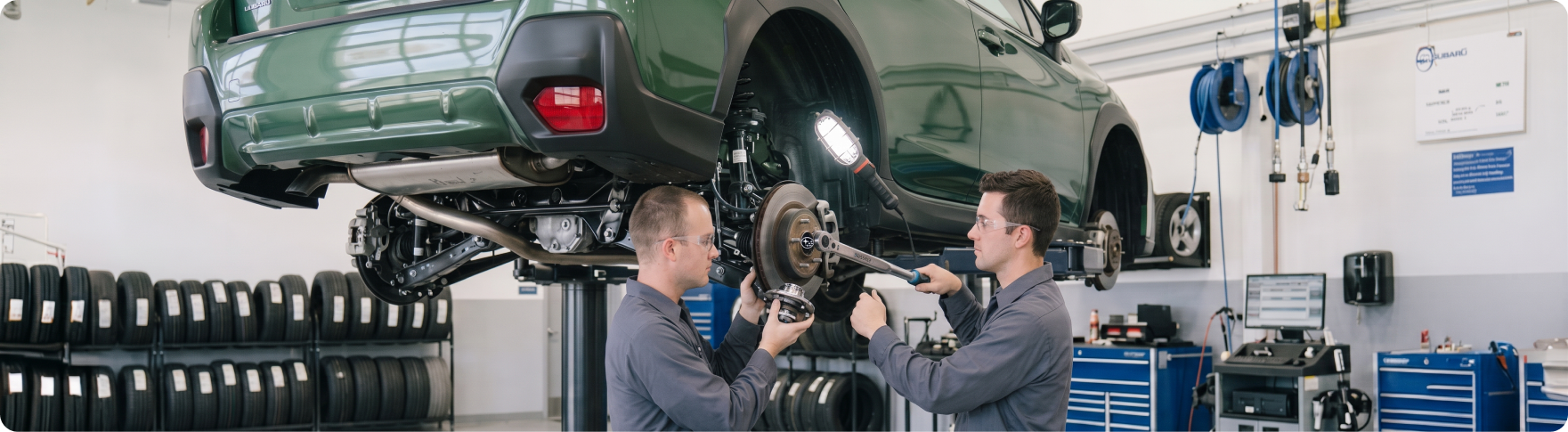 Subaru trained and certified technicians replacing suspension components on a Subaru at Briggs Subaru of Topeka